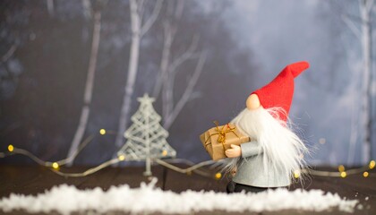Gnome with gift and tree in winter forest.