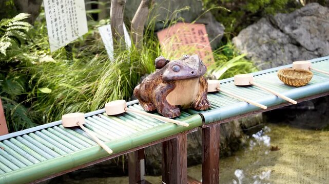 Water Purification Tools and a Frog Statue in Sanko Inari Shrine