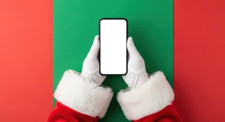 Santa's hand holding a white screen smartphone on green and red Christmas background , social media mockup 