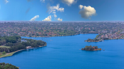 Fototapeta premium Aerial Panorama Drone view of Parramatta River Sydney Harbour between Balmain Gladesville Birkin Head Point and Roselle on the Bay Run Sydney NSW Australia