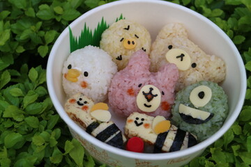 Animal-Shaped Rice Balls in a Bento Box