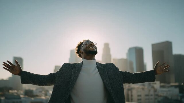 Urban Triumph: A figure, arms wide, finds joy against the city skyline, celebrating a personal victory in a moment of boundless freedom and aspiration.