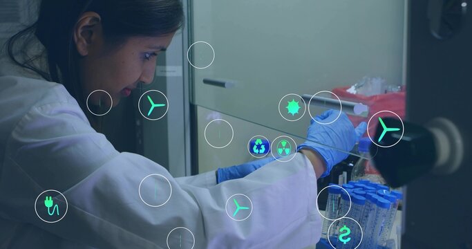 Leaning lab-tech handling blue tubes at lab bench, lab-coat, blue gloves, holo icons, copy space