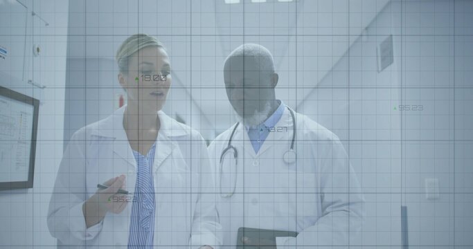 Walking doctors in labcoats using tablet in clinic hall, woman pointing pen, stethoscope, data grid
