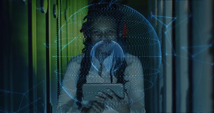 Holding tablet, braided woman scanning racks in datacenter, red headset, green LEDs, hologram