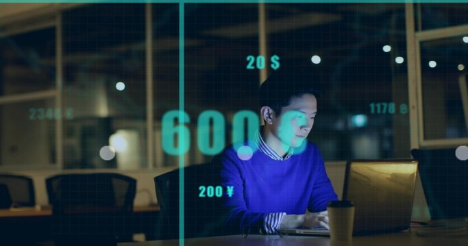 Asian man in blue sweater typing at laptop in conference room with financial graphics, copy space