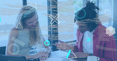 Leaning woman and man in red jacket annotating blueprints at office, tablet and pen