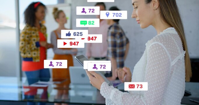 Tapping woman on right in white top using tablet in meeting room social overlays, copy space