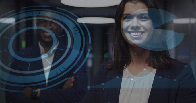 Smiling midadult woman in blazer standing in office by glass partition, showing blue AR UI overlays - Powered by Adobe