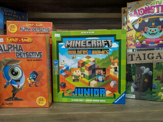 Naklejka premium Canada, 08 November 2025 : Colorful board games on toy store shelf featuring Minecraft junior edition