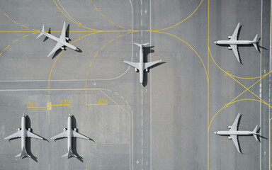 Aerial View of Parked Airplane on Airport Runway © 용석 주