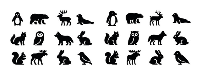 Fototapeta premium Silhouette icons of various animals including penguins, bears, moose, and rabbits