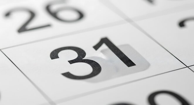 Close up of a calendar page showing the number 31 prominently displayed on a grid