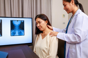 Senior woman receiving a neck examination from an orthopedic specialist in a hospital setting, highlighting clinical evaluation, pain diagnosis, and professional medical care for aging patients