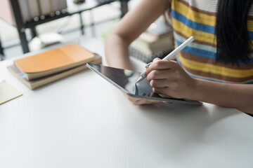 Asian woman Graphic designer working on digital tablet. artist drawing on graphic tablet female Artist Creative Designer sketch graphic drawing creative studying work