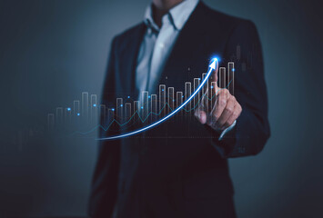 A business professional pointing at a rising financial graph symbolizes growth, data analysis, and successful performance, ideal for finance, investment, and corporate strategy concepts.