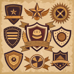 Vintage Industrial Shields Badges and Emblems with Wings and Ribbons vector illustration