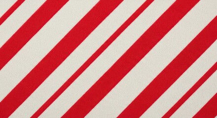 Obraz premium Red and white diagonal stripes pattern, festive candy cane background texture, classic peppermint stripe fabric design for holiday gift wrap
