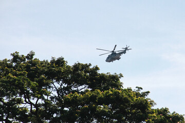 The Transportation helicopter on blue sky