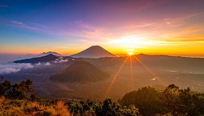 beautiful Mount Bromo at sunrise in East Java, Indonesia. The golden light of the morning sun illuminates the stunning volcanic landscape, with the iconic Bromo crater and Mount Semeru in the backgros