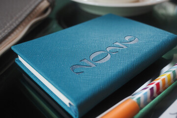 2026 goals on a notepad with colorful stationery and office supplies on a desk