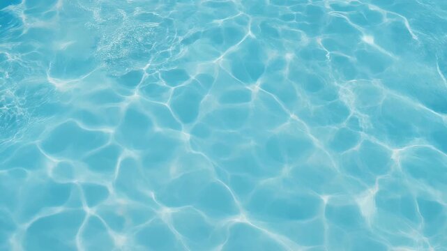 Beautiful turquoise water surface with ripples and reflections ideal for relaxation and summer vibes