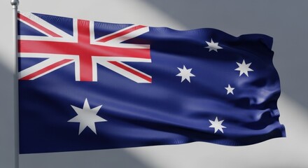 Waving flag of australia featuring the union jack and southern cross constellation.