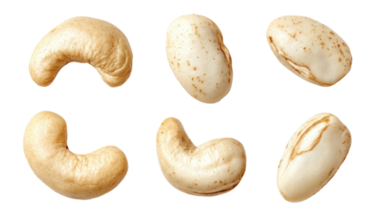 Six ivory-hued cashew nuts and beans on a plain black background