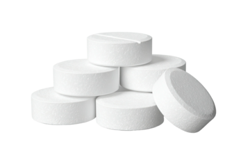 White pills stacked, medication, round tablets, textured surface