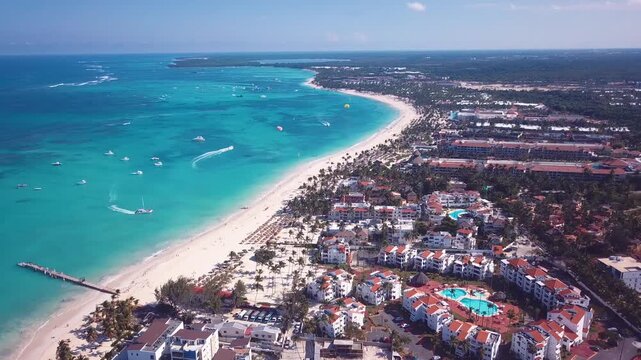 4k 24fps drone shoot of the hotels in punta cana in the beach with tourism