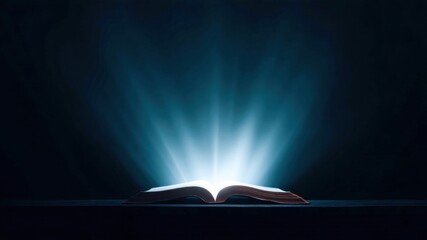 Glowing book open book light rays dark background spiritual faith christian religion hope inspiration. Glowing book with light rays dark background suggests spiritual faith and christian devotion