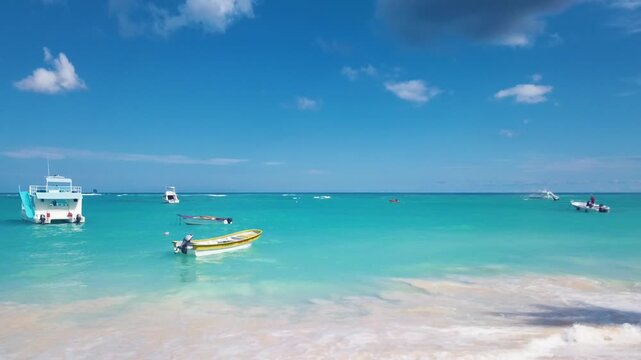 boat in the caribbean beach with blue water 4k 24fps