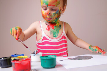 Toddler proving that minimalism is not her genre