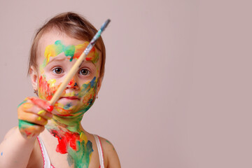 Young artist clearly ignoring the “paint on paper” rule