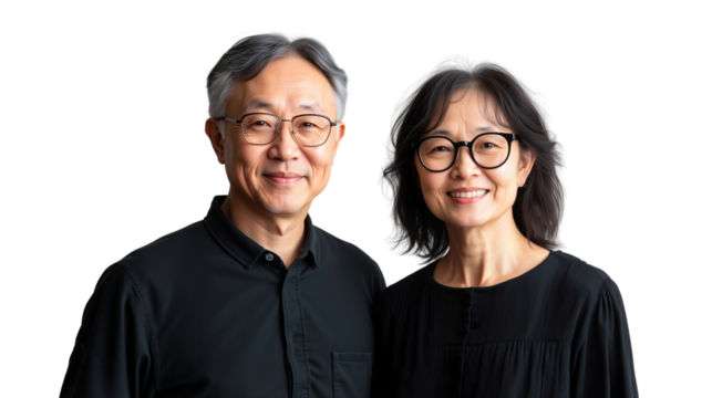 Portrait of a happy senior Asian couple wearing glasses and matching black shirts, isolated on transparent background, png
