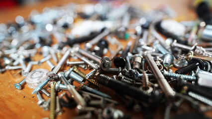 Industrial hardware components: close-up of silver bolts and nuts