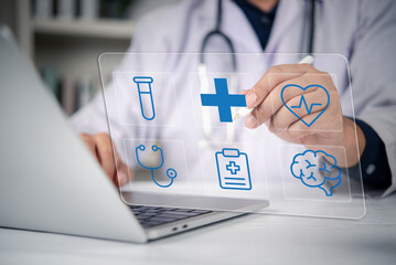 Doctor hand pointing virtual medical icons hologram screen laptop. Digital healthcare technology...
