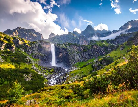 Majestic waterfall cascades down a rocky mountain, surrounded by greenery