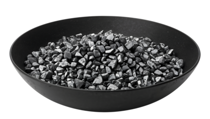 Shungite stones in black bowl on the transparent background  natural mineral crystals, healing, meditation, wellness, energy, protection