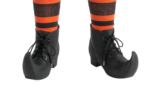 Halloween witch costume boots with curled toes and orange black striped socks isolated on the transparent background