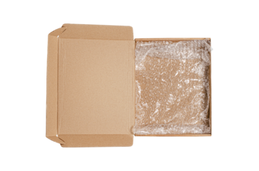 An open cardboard box with bubble wrap. The concept of packaging parcels with fragile cargo. Isolated on white