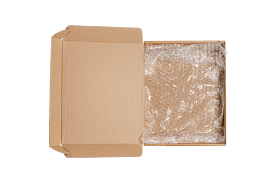 An open cardboard box with bubble wrap. The concept of packaging parcels with fragile cargo. Isolated on white