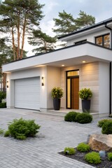 Modern luxury house exterior with garage and driveway