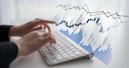 A business professional engages in market analysis, using a keyboard and observing dynamic financial graphs that depict stock performance and investment trends. Scalp