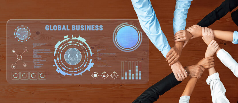 A unique perspective on global business dynamics featuring hands joining over a digital dashboard illustrating analytics, graphs, and collaboration for success. Trope - Powered by Adobe