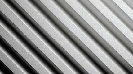 Obraz premium Abstract grayscale image featuring diagonal parallel ribbed textures with high contrast lighting, creating a sense of depth and pattern.