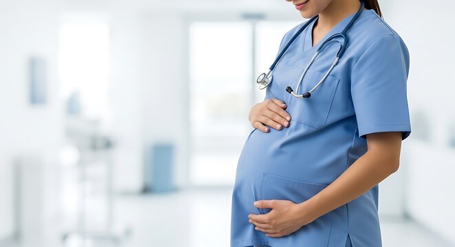 Pregnant nurse in blue scrubs holding her belly in a hospital setting - Powered by Adobe