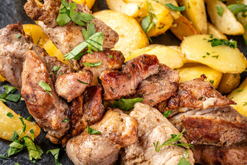 Roasted meat with golden potatoes