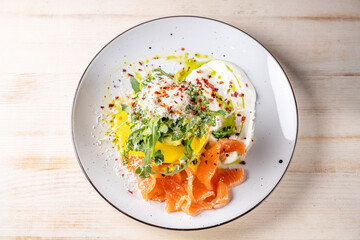 Top view brunch plate with salmon and eggs