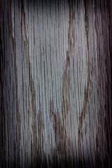 wooden background, board gray surface, natural wood pattern, ash tree, vignetting, frame with a place for text or object, vertical, close-up